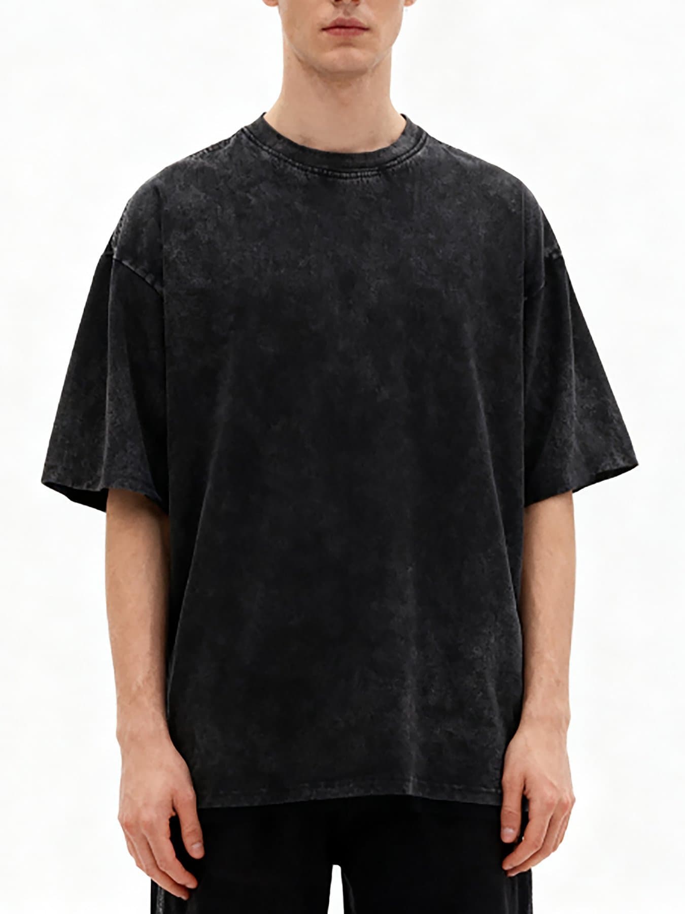 Model wearing the black heavyweight snow-wash cotton T-shirt